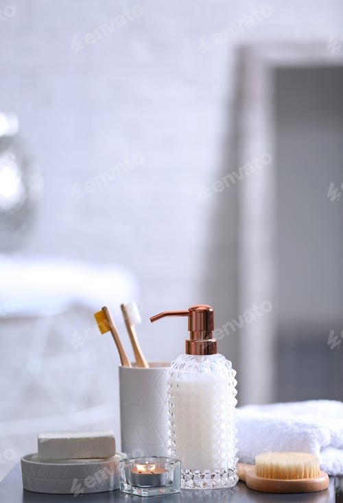 Preview: Composition with soap and toiletries on table against blurred background. Space for text
