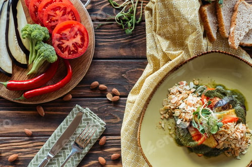 Preview: flat lay with vegetarian salad, almonds, chili peppers, fresh vegetables and pieces of bread on