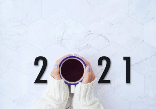 Preview: Start to new year 2021 concept ,top view of woman hands holding hot cup of coffee