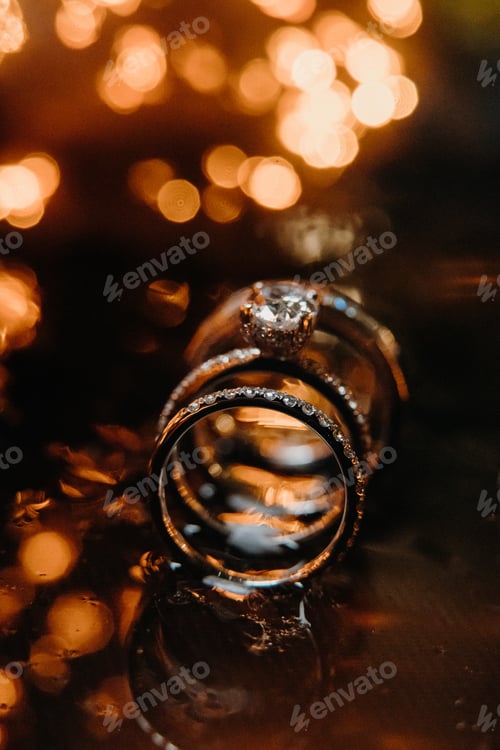 Preview: an image of an open wedding ring on a table outside