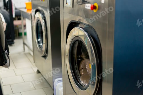 Preview: close up professional dry cleaning washing machine washing process professional delicate equipment