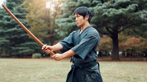 Preview: Weapon, Japanese man and outdoor for martial arts as athlete in training, exercise or stance. Male