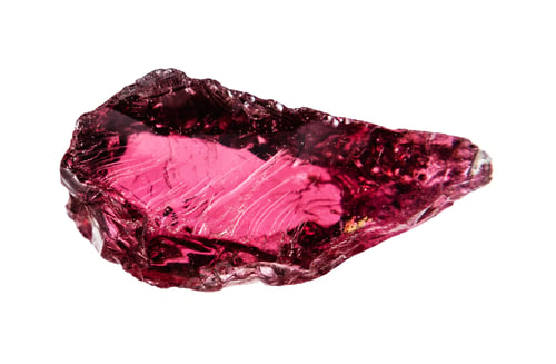 Preview: raw rhodolite crystal isolated on white