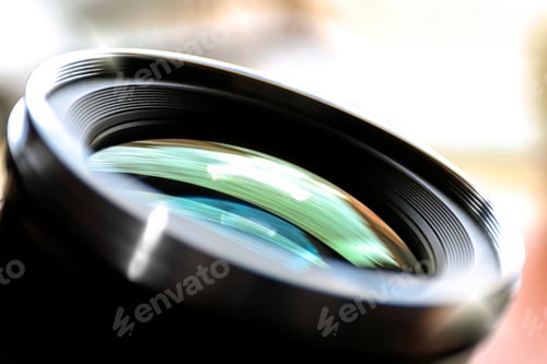 Preview: Photographic lens, front glass reflection