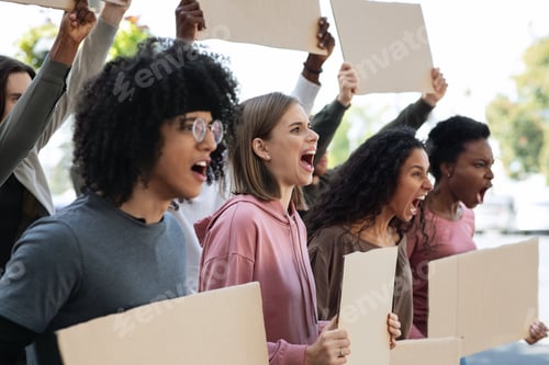 Preview: Motivated group of international students making protest outdoors