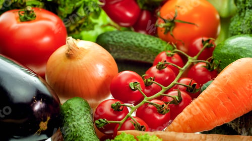 Preview: Closeup image of onions, cucumber, carrot, bell pepper, eggplant and salad leaves
