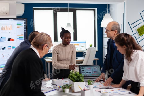 Preview: Diverse colleagues businesspeople discussing company issue