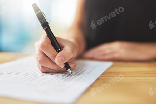 Preview: Assessment time. Shot of a woman filling in an answer sheet for a test.