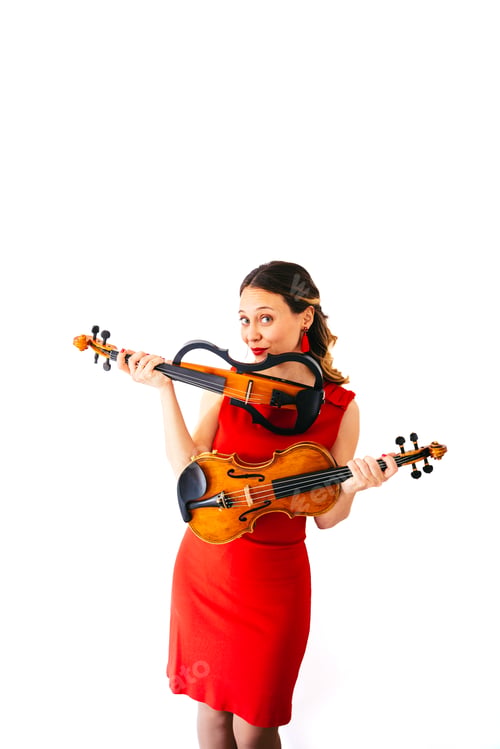 Preview: Musician posing with acoustic and electric violins wearing red dress