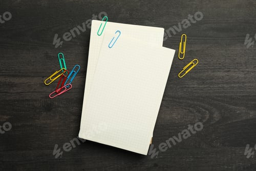 Preview: Concept of different office accessories - paper with clip