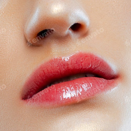 Preview: Glossy red lips close-up of young caucasian female reflecting light and texture