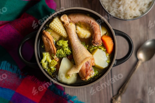 Preview: Overhead shot of Honduran chicken soup on the table