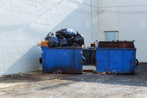 Preview: Full construction rubbish bin with loads at construction site waste debris container, garbage