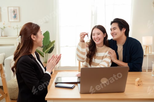 Preview: Couple Consults Real Estate Agent for Home Sale Advice in a Modern Office Setting
