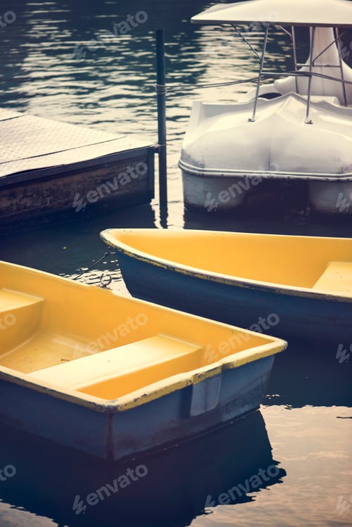 Preview: Paddle boats in a dark lake