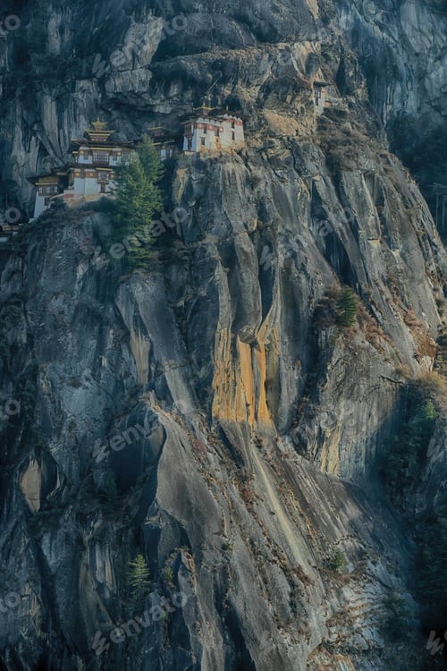Preview: Vertical shot of the Paro Taktsang monastery Vajrayana Himalayan Buddhist site in Bhutan