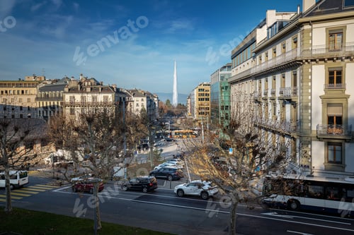 Preview: Street view of Geneva with Jet D’eau Water Fountain on background - Geneva, Switzerland