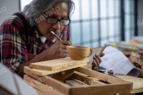 Preview: concept of wood DIY at home, carpenter working with wood
