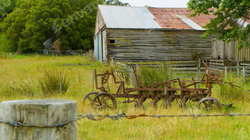 Preview: Picturesque old barn in a rural setting, situated on the side of a winding country road