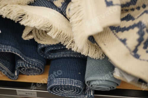 Preview: Towels and carpets in a store