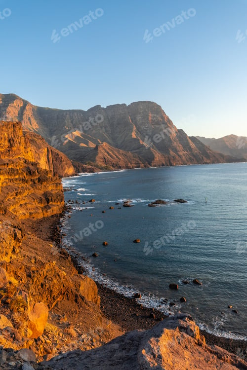 Preview: Cliffs and the coast of Agaete at summer sunset in Gran Canaria. Spain