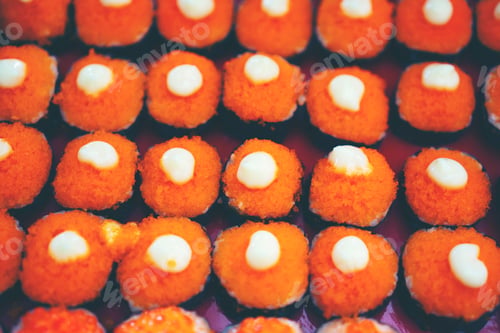 Preview: Japanese sushi arranged in a serving tray of a Japanese restaurant.