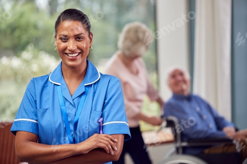Vista previa: Portrait Of Female Nurse Or Care Worker Making Home Visit To Senior Couple With Man In Wheelchair