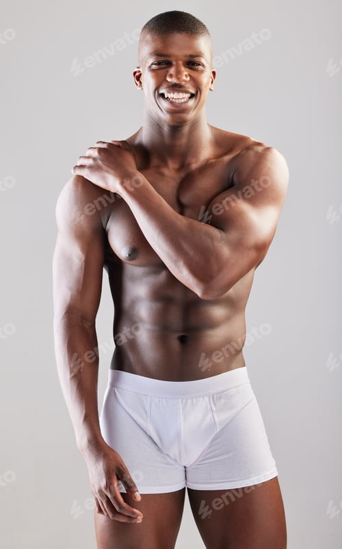 Preview: Big boys dont cry. Studio portrait of a muscular young man posing against a grey background.