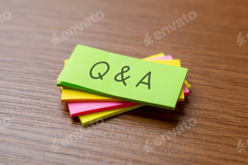 Preview: A stack of colorful sticky notes with handwritten letters "Q and A".