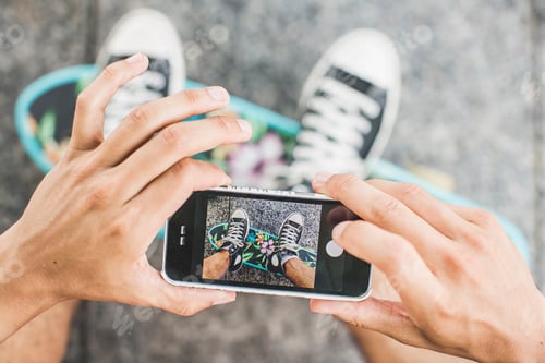 Preview: Capturing the moment friends sharing a snap of their funky shoes.