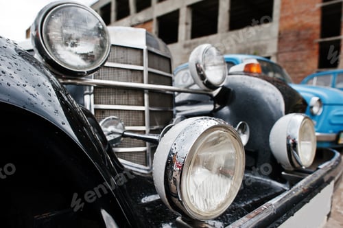 Preview: Old vintage car headlight close up.