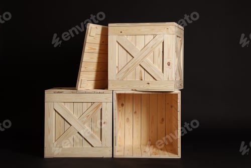 Preview: Group of wooden crates on black background