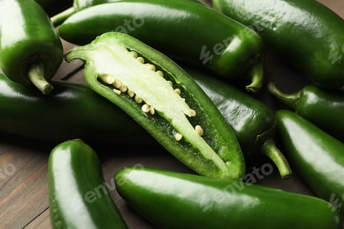Preview: Fresh jalapeno peppers on wooden table, closeup