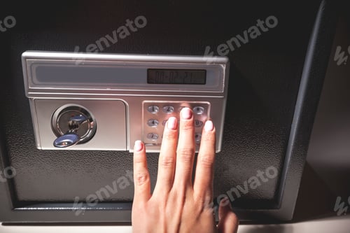 Preview: hand opened a safe, close up