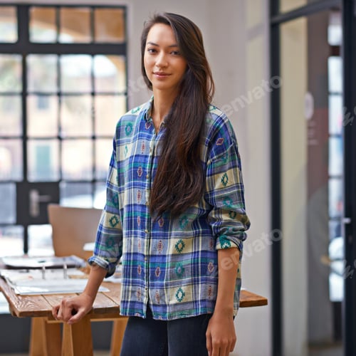 Preview: Her designs are as cool as she is. Portrait of a young female designer in a modern office.