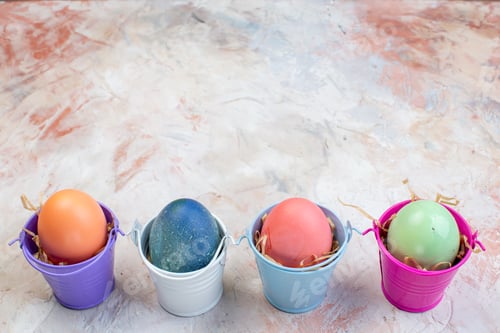 Preview: front view colored easter eggs inside separate little baskets on light background ornate spring