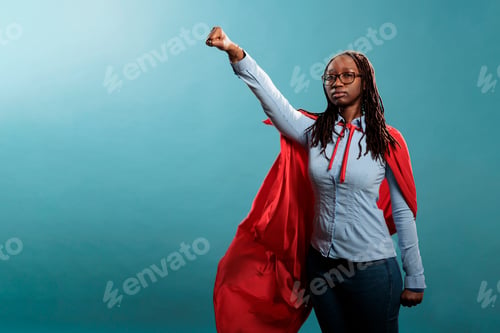 Preview: Proud and strong african american justice defender looking ambitious while looking at camera.