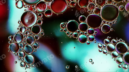 Preview: Abstract Colorful Food Oil Drops Bubbles and spheres Flowing on Water Surface