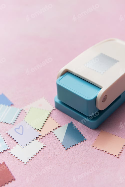 Preview: Punching decorative paper shapes for creative scrapbooking craft