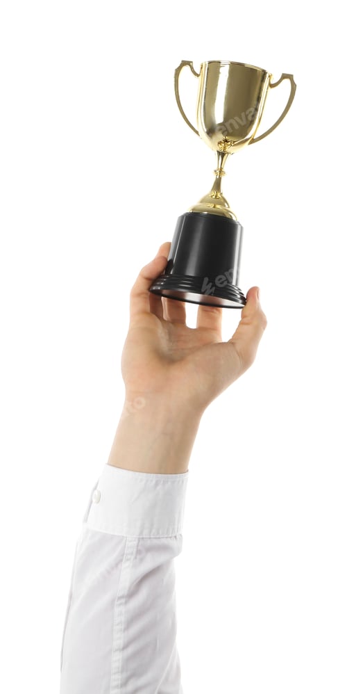 Preview: Man with golden trophy cup on white background, closeup