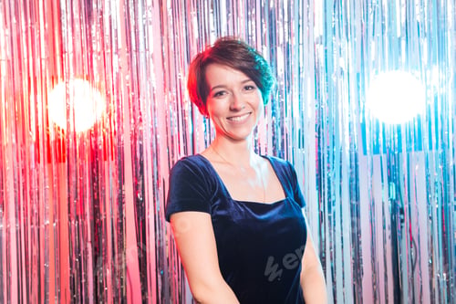 Preview: people, birthday party, holidays and glamour concept - smiling woman in evening dress over lights