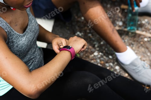 Preview: Woman checking her smart watch