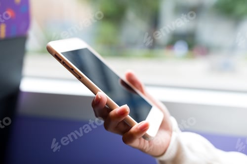 Preview: Woman use of mobile phone inside bus of Hong Kong