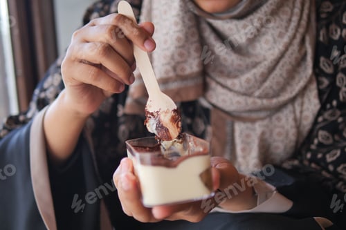 Preview: Enjoying dessert at a cozy cafe in the afternoon