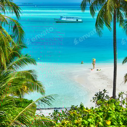 Preview: Toddler boy on beach with mother