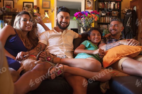 Vista previa: Girl and family watching TV on living room sofa
