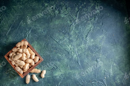 Preview: top view fresh peanuts on dark-blue background nut hazelnut snack cips walnut color photo free place