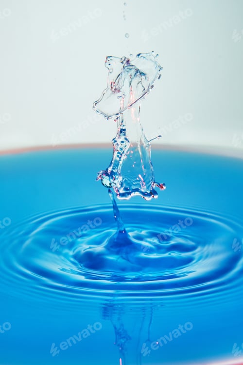 Preview: Abstract background of splash of color water, collision of colored drops, the concept