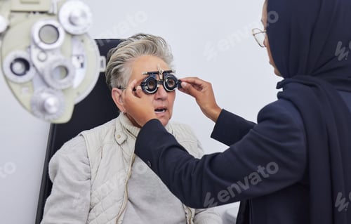 Preview: Eye exam, glasses and senior woman with optometrist in clinic for testing eyes, check eyesight and