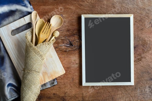 Preview: wooden utensil in kitchen on old wooden background with blackboard and copy space